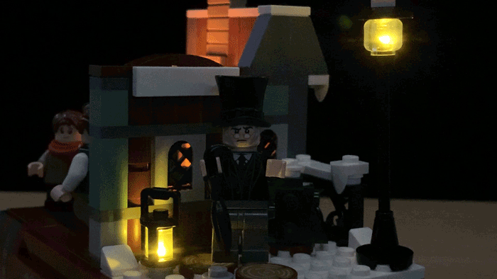 Animated gif showing flickering lights turned on in the Brickstuff light kit for the LEGO Charles Dickens Tribute set (#40410)-- exterior view.