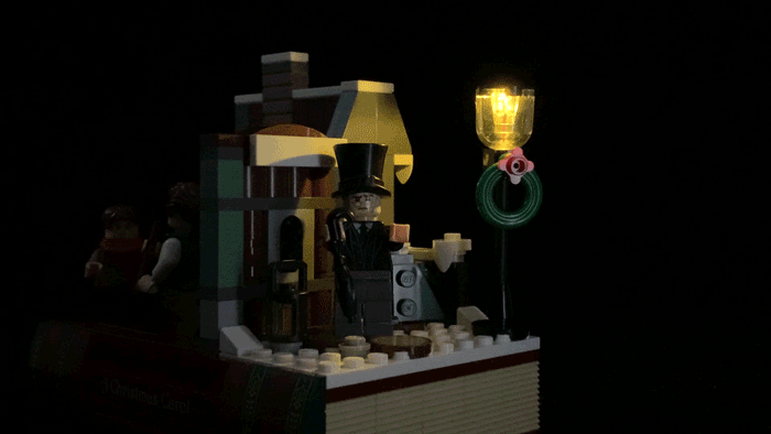 Animated gif showing LEGO lamp post with flickering Brickstuff LED installed and powered on.