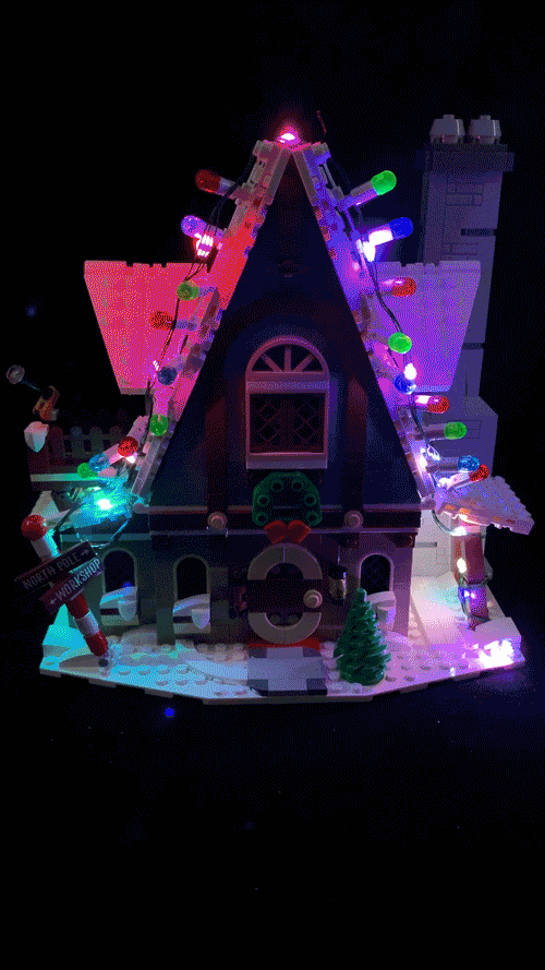 Animated gif showing color-changing light string attached to a LEGO gingerbread house.